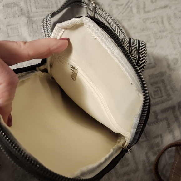 Purse, new cross body sling black and white adjustable strap. - Picture 2 of 5